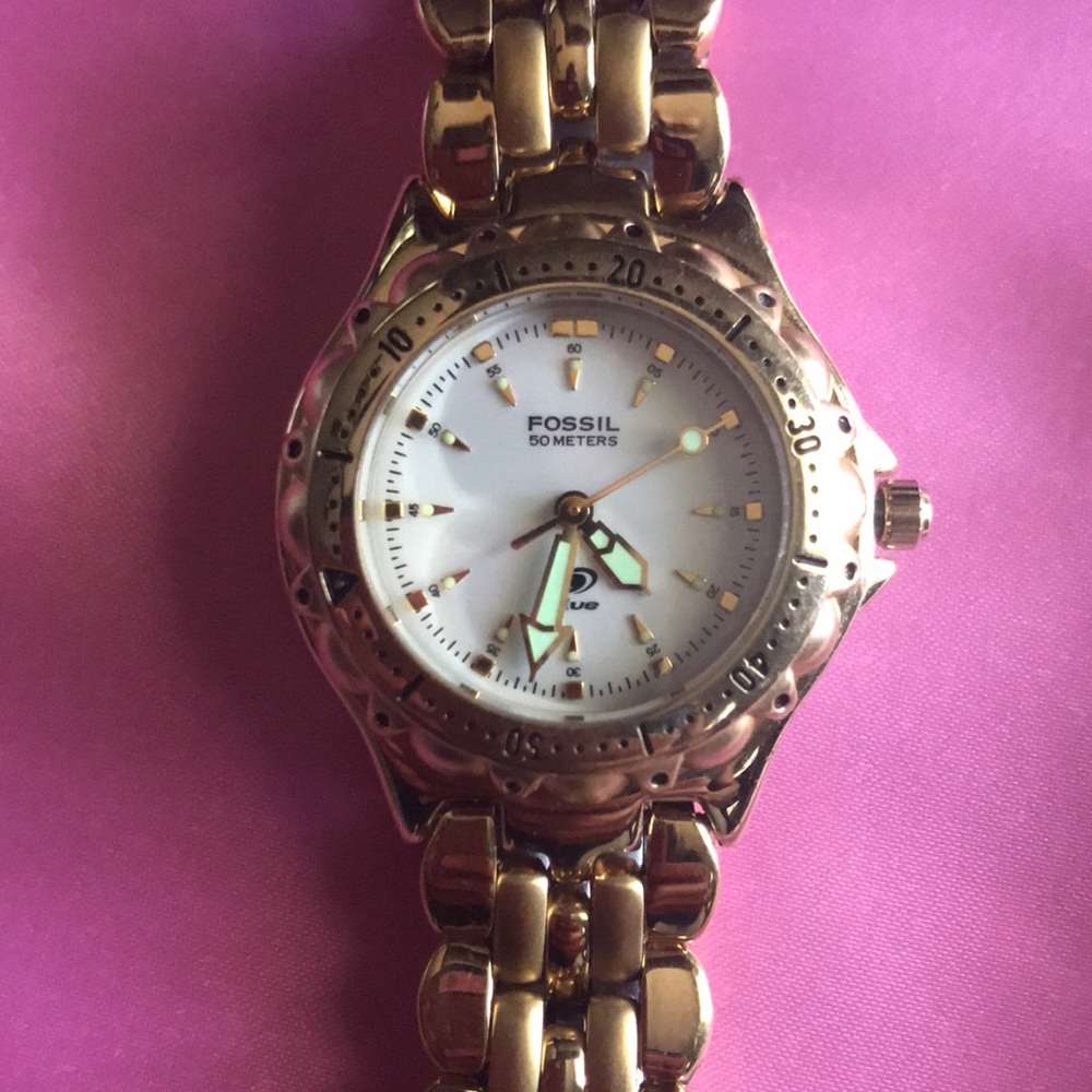Fossil Blue AM 3116 Ladies Gold Plated Stainless Steel Bracelet Watch.